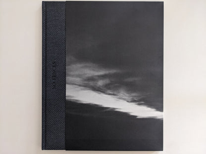 Front cover of 'No Fences' featuring a black-and-white cloud formation over a dark landscape