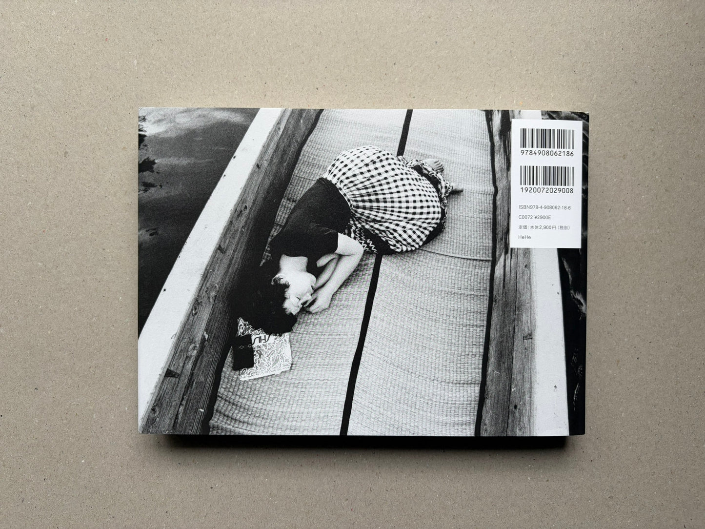 Nobuyoshi Araki, Sentimental Journey 1971–2017, back cover with barcode and a black-and-white reclining figure