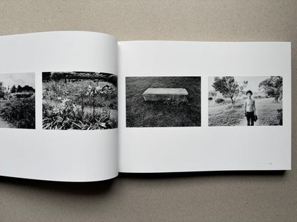 Nobuyoshi Araki, Sentimental Journey 1971–2017, open spread with black-and-white landscape and portrait photographs