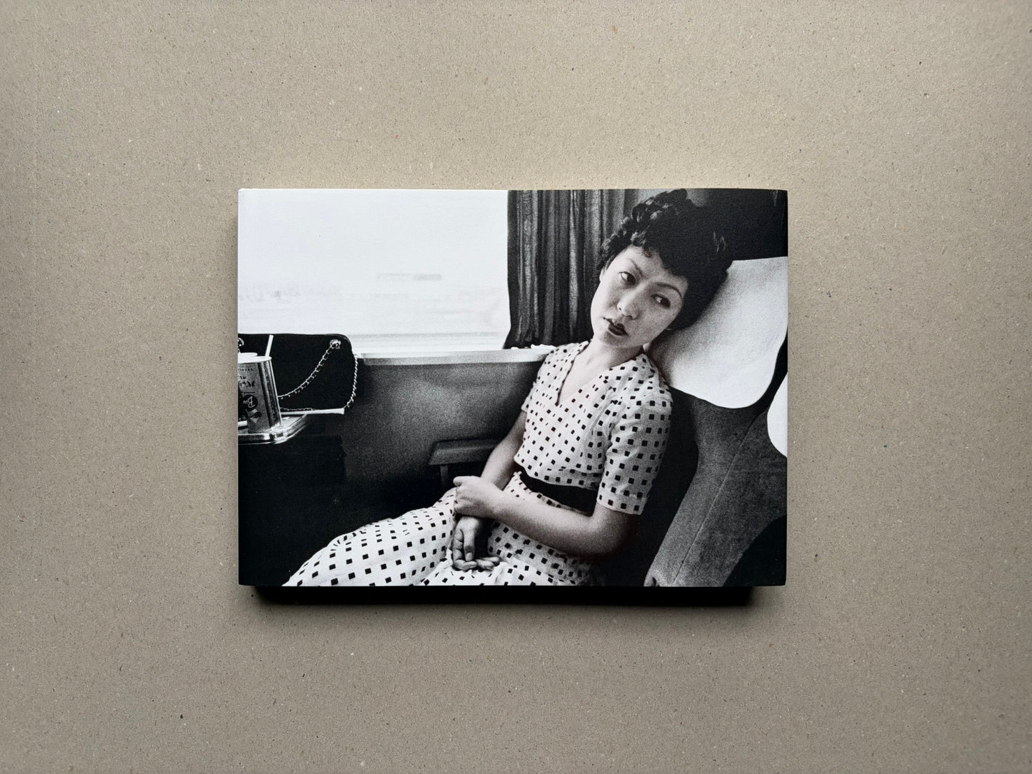 Nobuyoshi Araki, Sentimental Journey 1971–2017, front cover with a black-and-white photograph of a seated woman