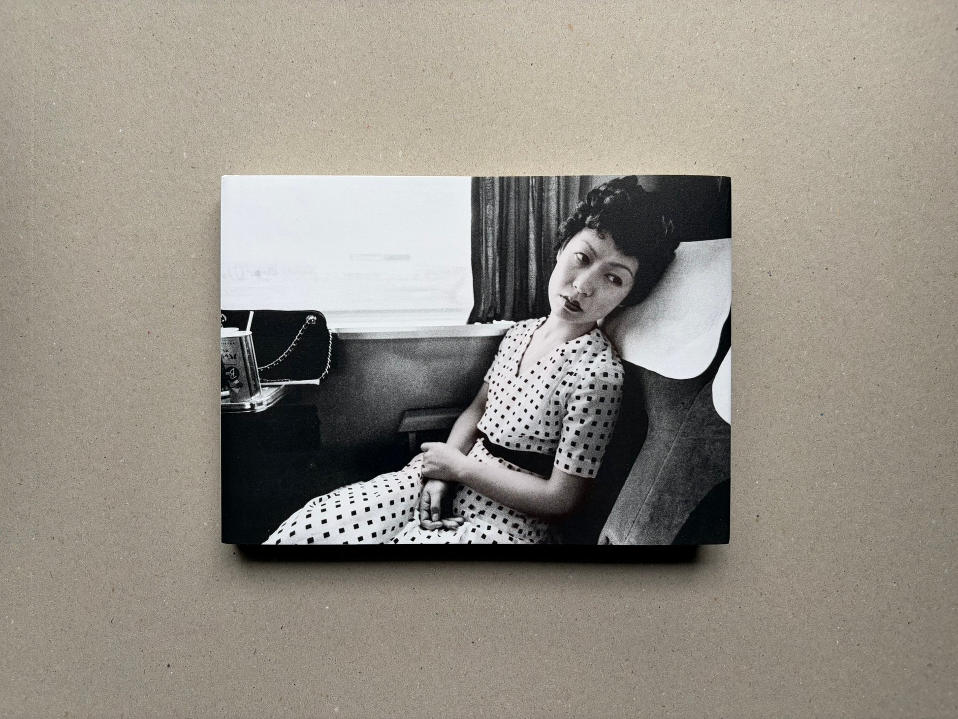 Nobuyoshi Araki, Sentimental Journey 1971–2017, front cover with a black-and-white photograph of a seated woman