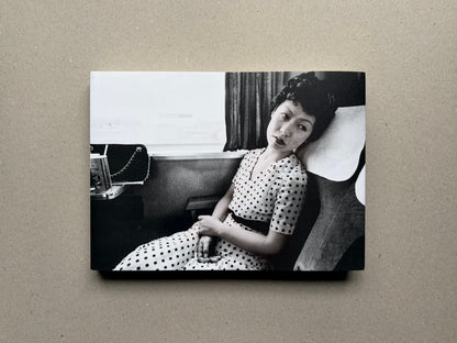 Nobuyoshi Araki, Sentimental Journey 1971–2017, front cover with a black-and-white photograph of a seated woman