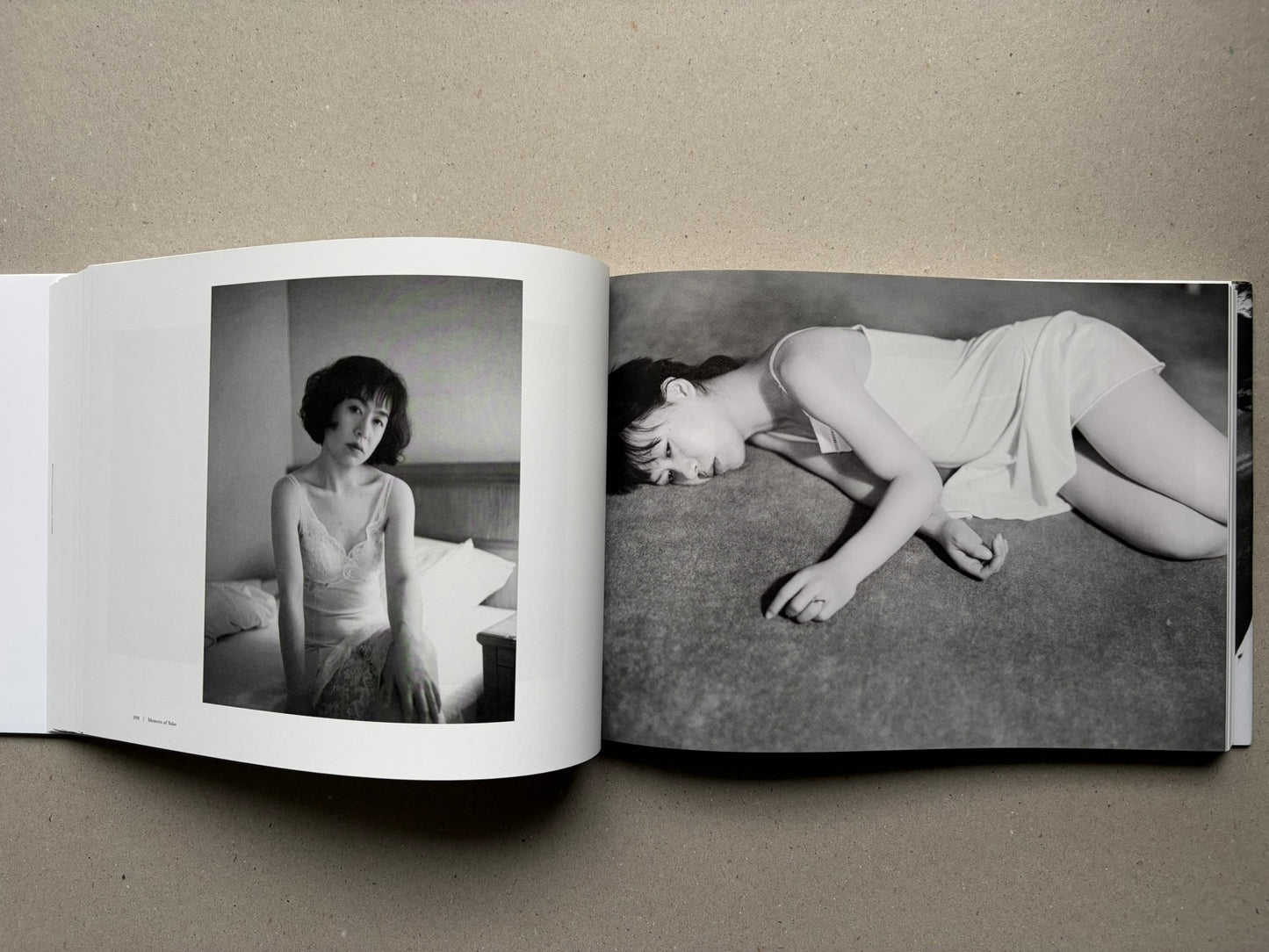 Nobuyoshi Araki, Sentimental Journey 1971–2017, open spread with black-and-white portraits of Yoko