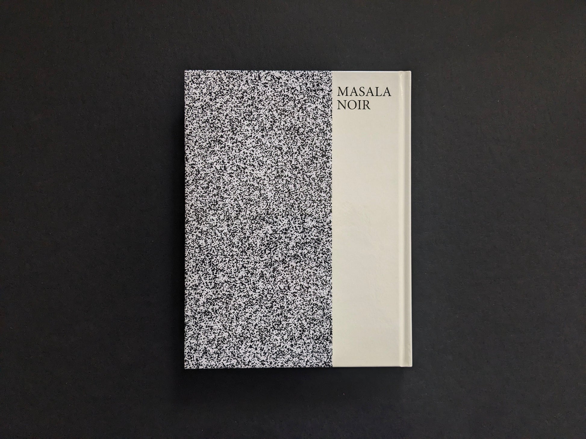 Back cover of Noise Graphics 1980–1990 with the static-like pattern and Masala Noir imprint.