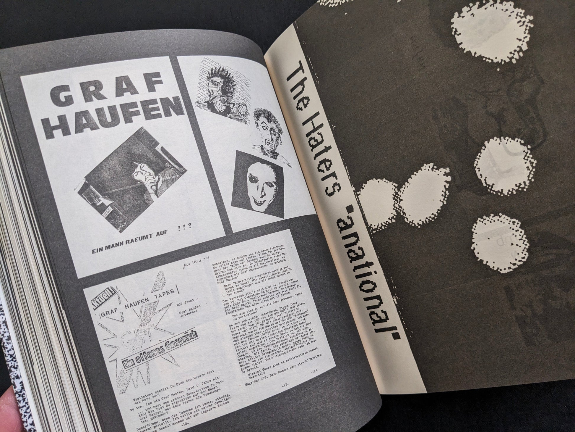 Interior spread with bold German-language graphics and adjacent band artwork in high-contrast print.