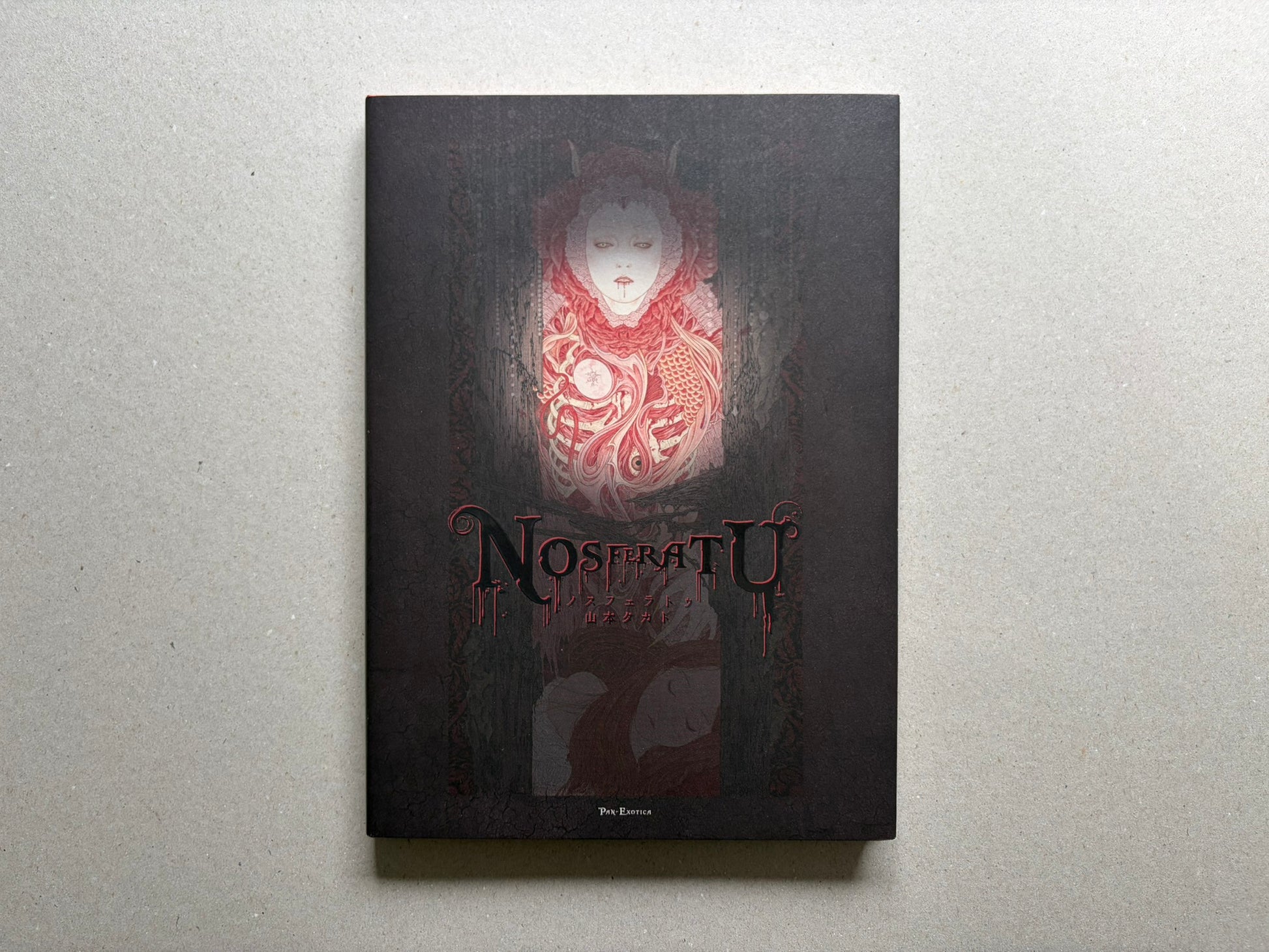 NOSFERATU by Takato Yamamoto, front cover with dark artwork and title on a black background.