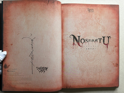 NOSFERATU by Takato Yamamoto, signed title page spread with the artist’s signature visible.