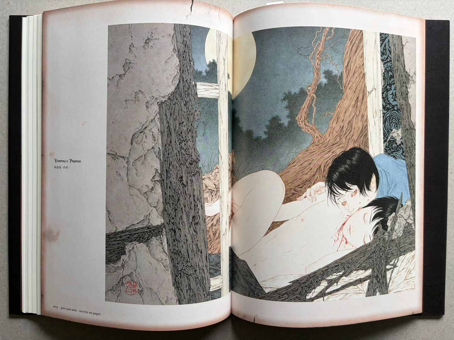 NOSFERATU by Takato Yamamoto, page spread displaying a Japanese ukiyo-e woodblock print with a reclining figure, tree trunk, and pale moonlit sky.