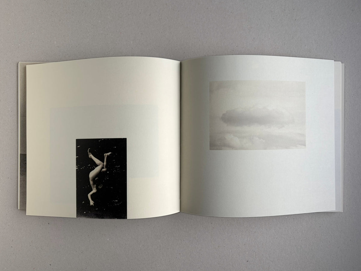 Nusa by Masao Yamamoto, open spread with two small inset images