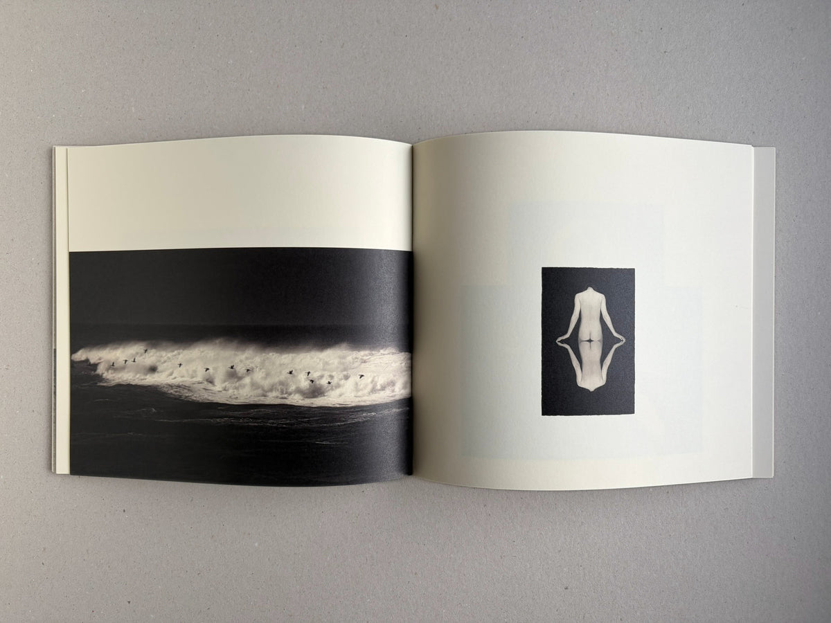 Nusa by Masao Yamamoto, open spread with a black-and-white image on the left and a figure on the right