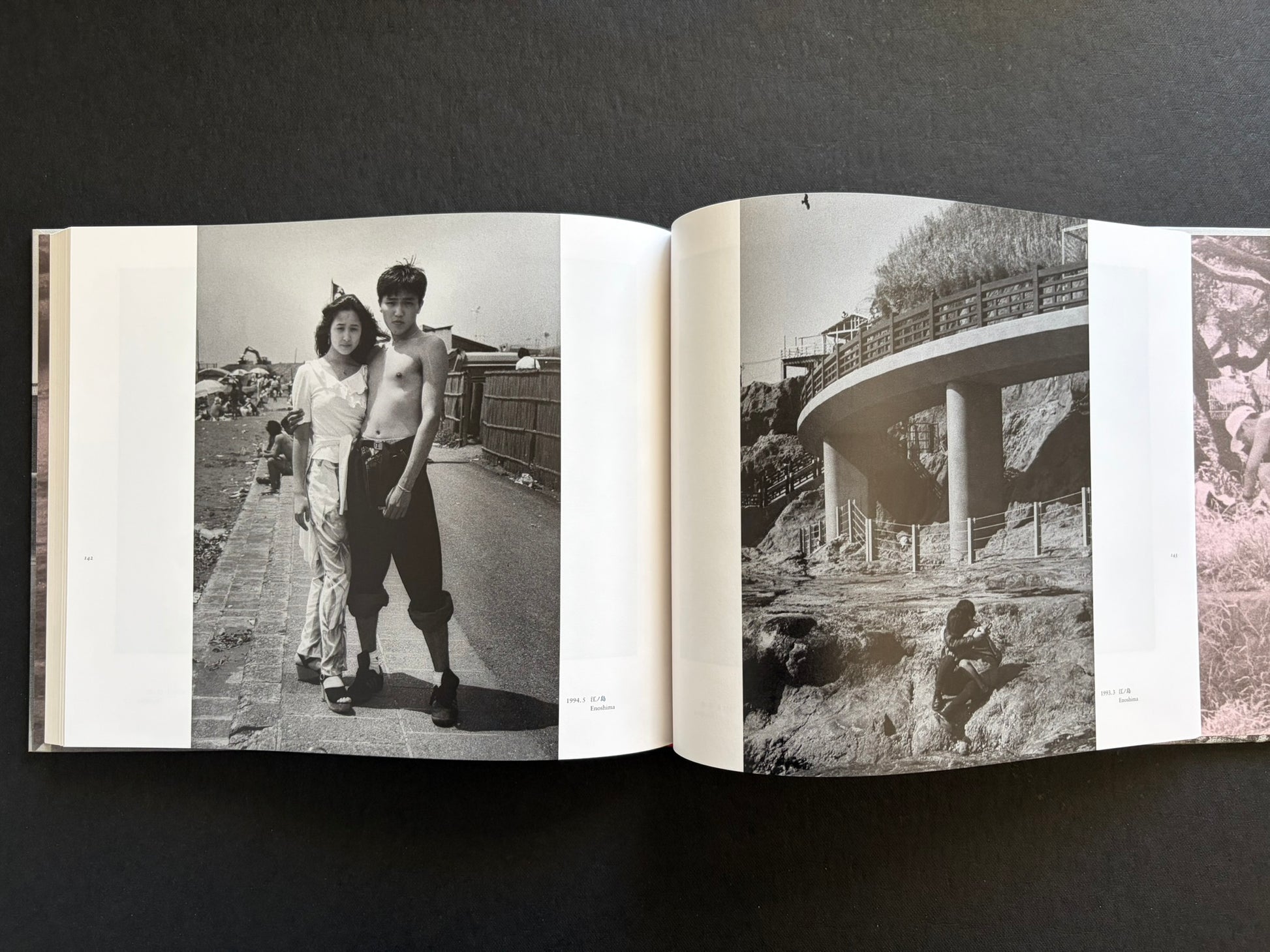 Interior spread with a young couple at Enoshima and a curved coastal walkway.
