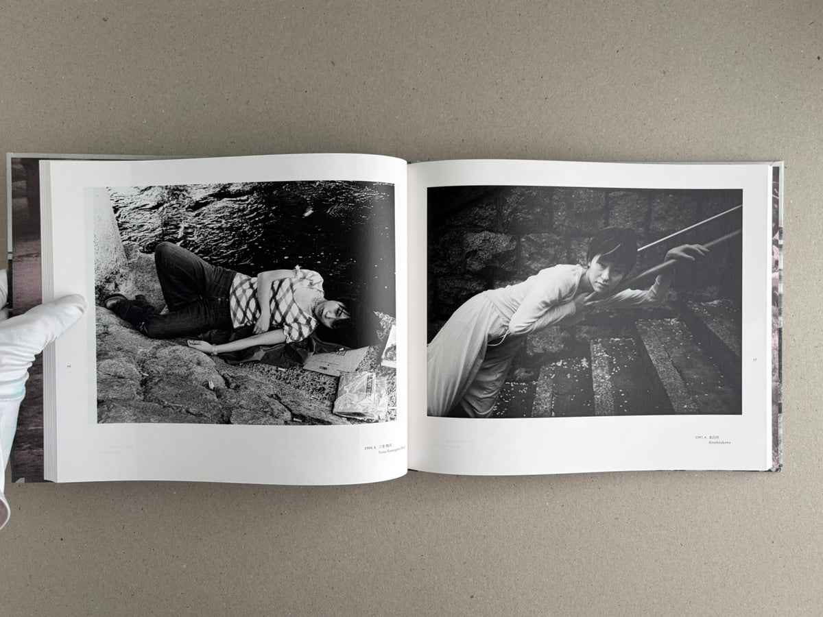 Open spread of Obi and Sand: Kyoto/Enoshima by Yoshio Mizoguchi, showing two black-and-white photographs on facing pages.