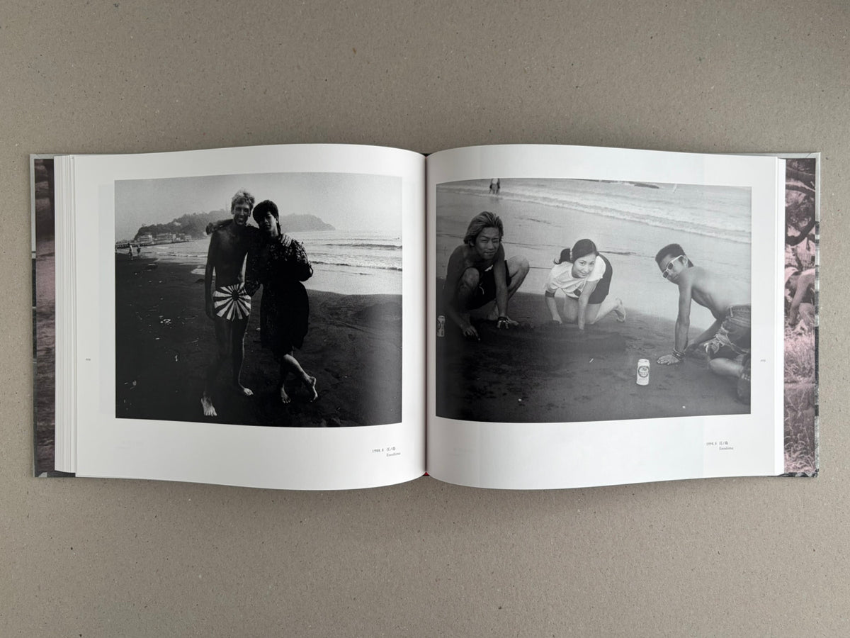 Open spread from Obi and Sand: Kyoto/Enoshima showing two black-and-white beach photographs in the book.