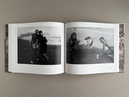 Open spread from Obi and Sand: Kyoto/Enoshima showing two black-and-white beach photographs in the book.