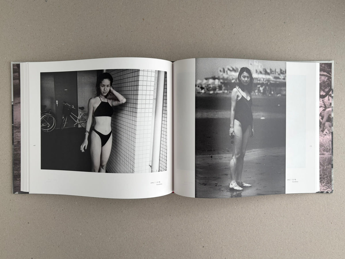 Open spread from Obi and Sand: Kyoto/Enoshima by Yoshio Mizoguchi, showing two black-and-white photographs of women in swimwear.