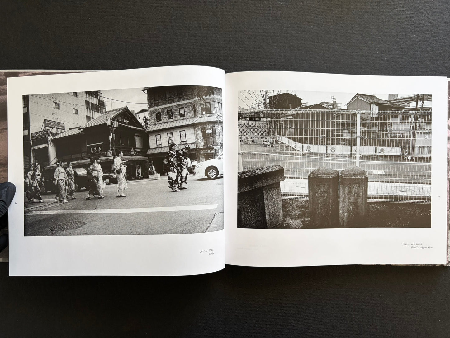 Interior spread with women in kimono crossing a Kyoto street and a quiet riverside scene.