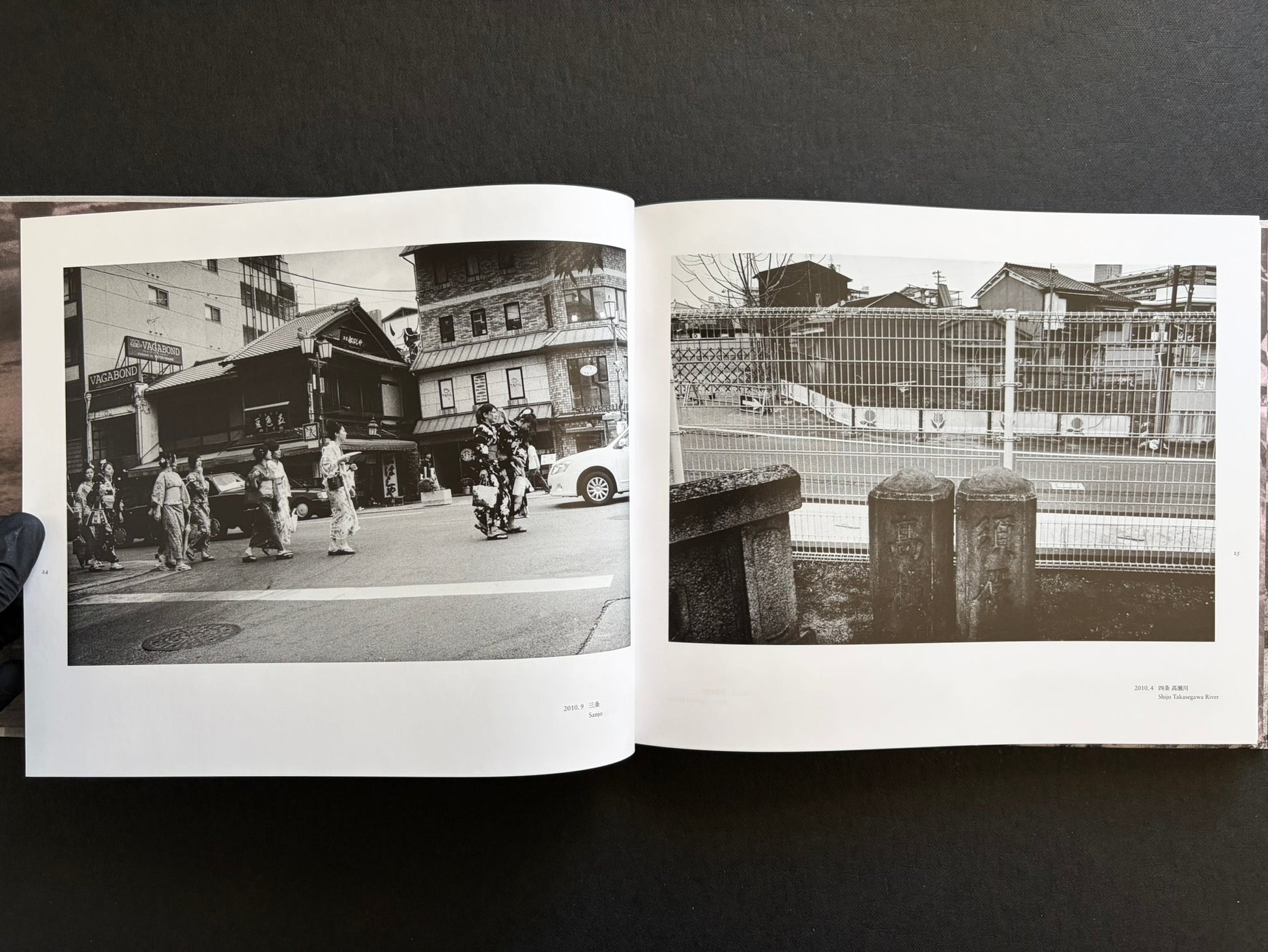 Interior spread with women in kimono crossing a Kyoto street and a quiet riverside scene.