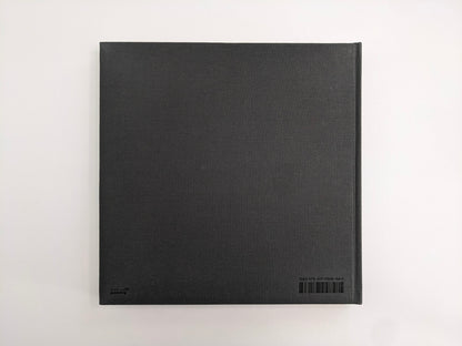 Back cover of Oleksandr Glyadyelov photobook, plain grey cloth hardcover by IST Publishing.