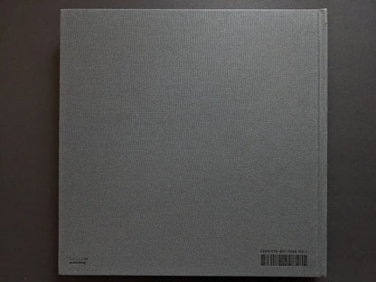Back cover of Oleksandr Glyadyelov photobook, plain grey cloth hardcover by IST Publishing.