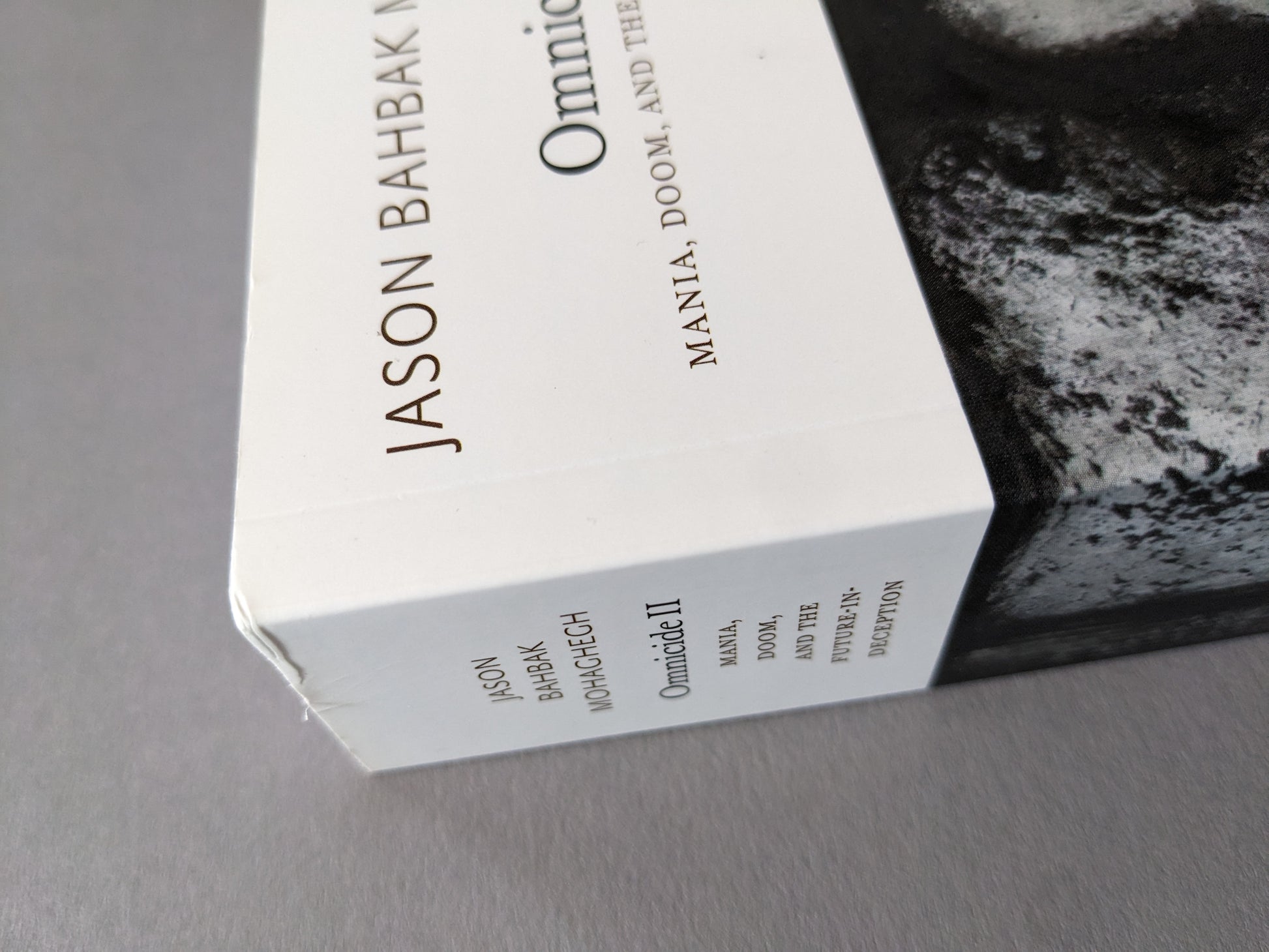 Folded edge and scuff on the top of the book cover – minor cosmetic defect.