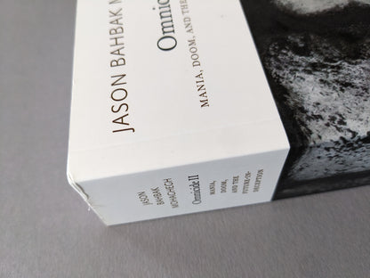 Folded edge and scuff on the top of the book cover – minor cosmetic defect.