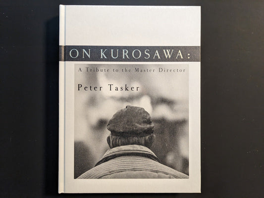 Front cover of “On Kurosawa: A Tribute to the Master Director” by Peter Tasker, hardcover with monochrome portrait design.