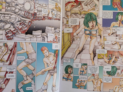 Interior spread from Parasitic City #0.2, showing fragmented bodies and post-human surgery in a futuristic cityscape