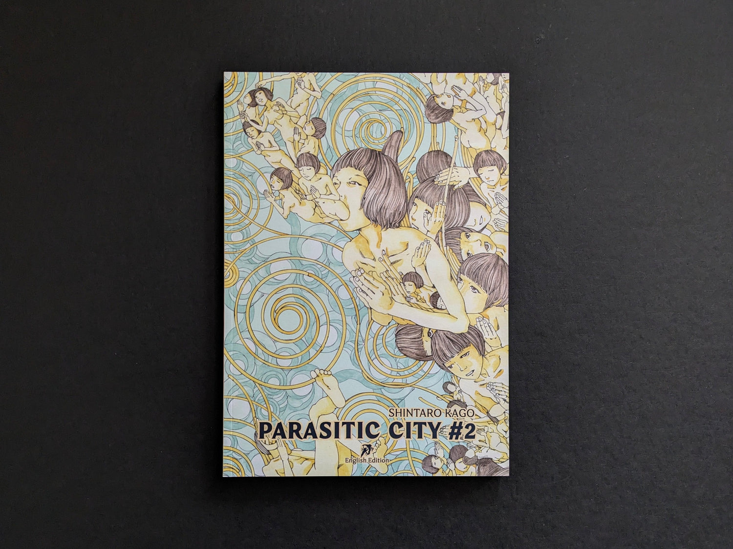 Front cover of Parasitic City #2 by Shintaro Kago, with surreal bodies in a swirling reincarnation motif.