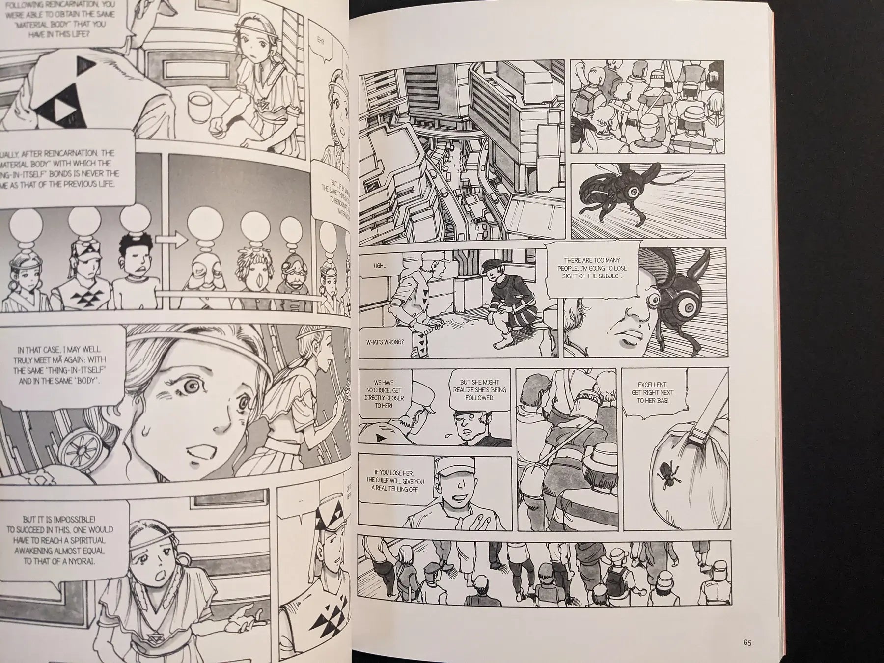 Interior pages with a group discussion about reincarnation and a small insect-shaped surveillance parasite in a crowd.