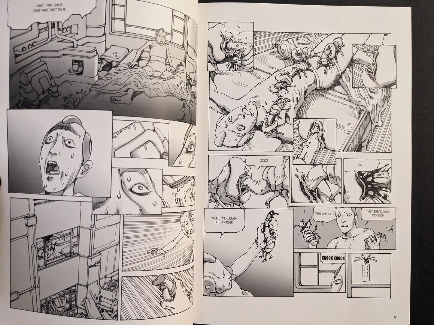 Interior spread from “Parasitic City #3” with a restrained patient covered by segmented parasites in a clinical room, drawn in grey-scale.