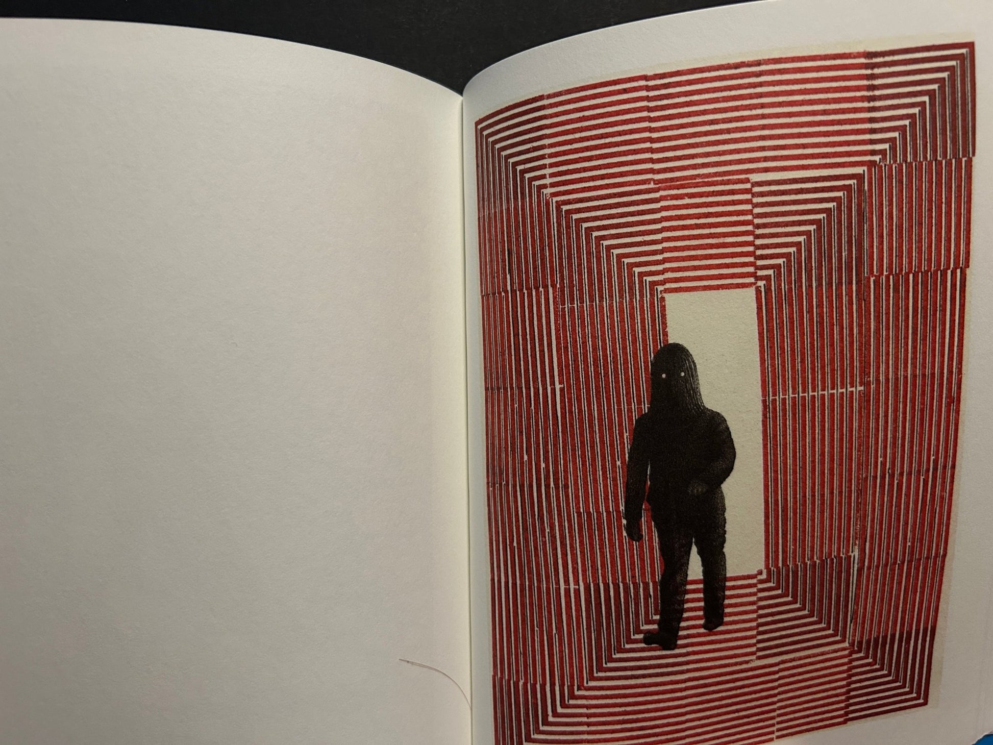 Interior spread from Pièces montées showing a red stamped geometric frame and a dark figure