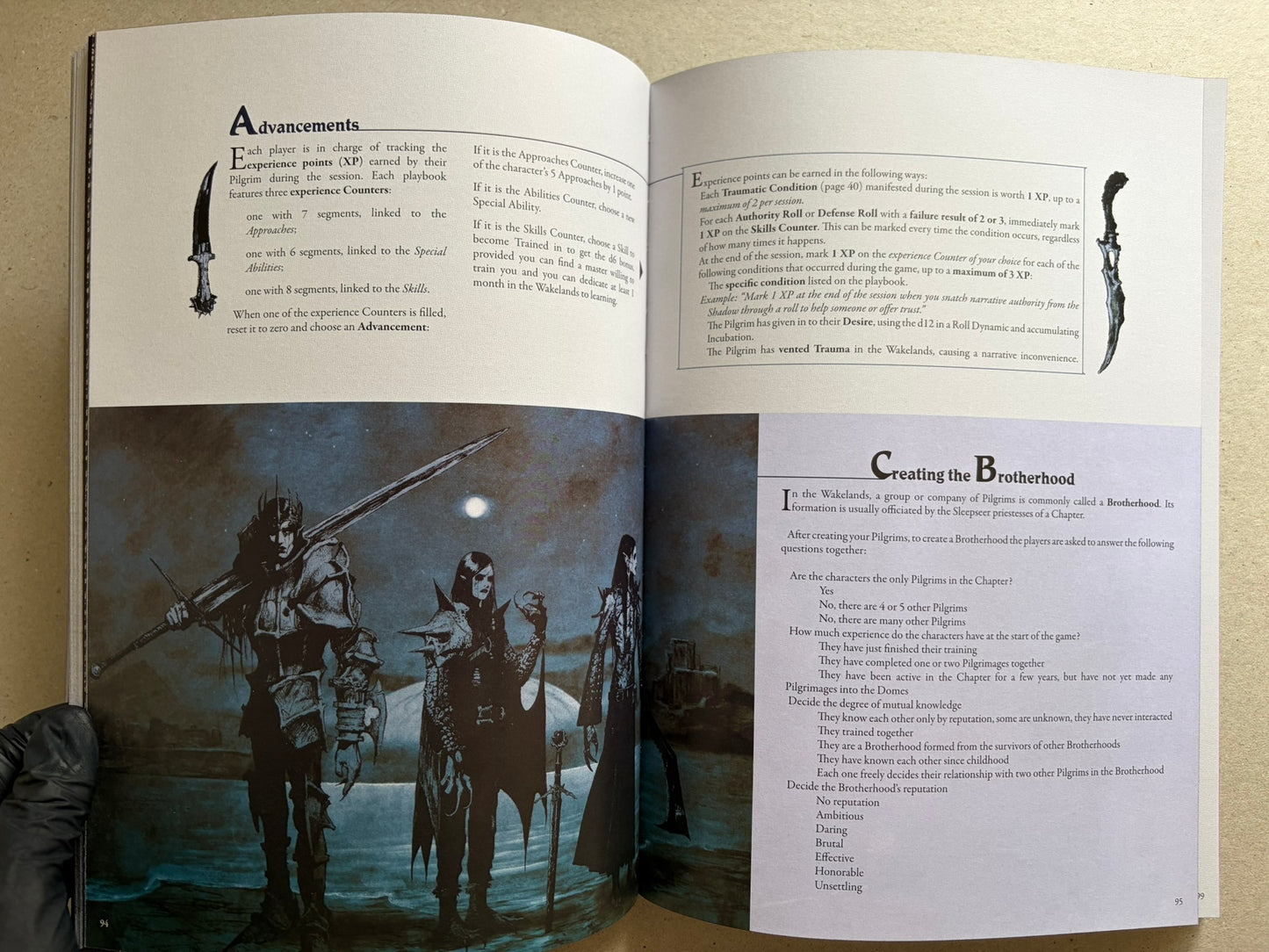 Open spread with advancements text, a small dagger illustration, and a moonlit group scene below