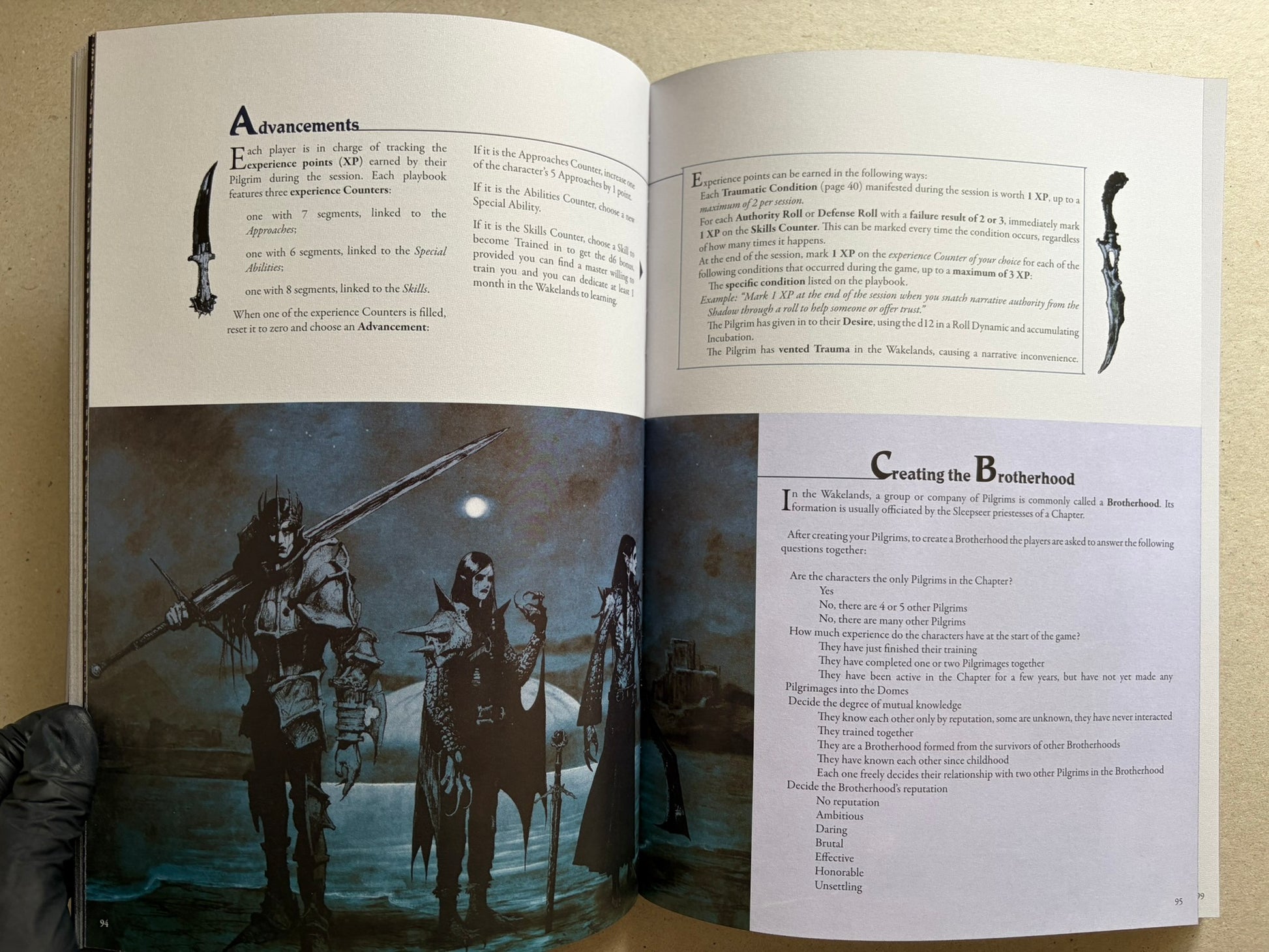 Open spread with advancements text, a small dagger illustration, and a moonlit group scene below