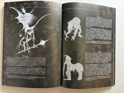 Open spread with Misfortune and Halfmorph illustrations on a dark background