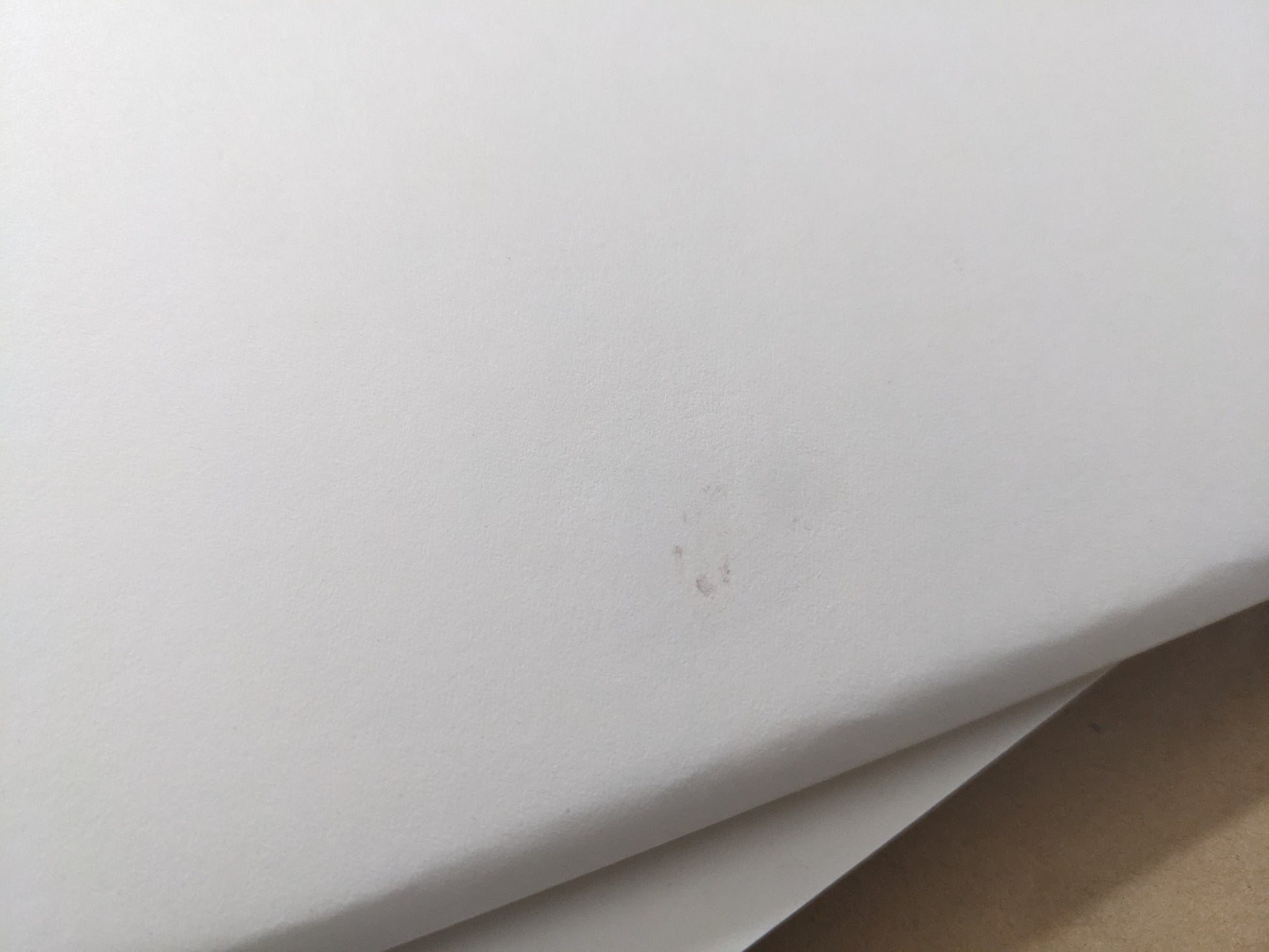 Small production stain visible on the cover.
