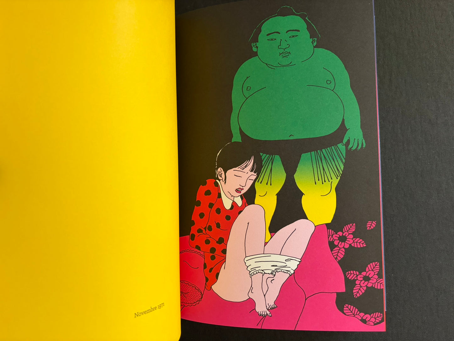 Interior spread from Rêve écarlate with a green figure standing over a seated woman