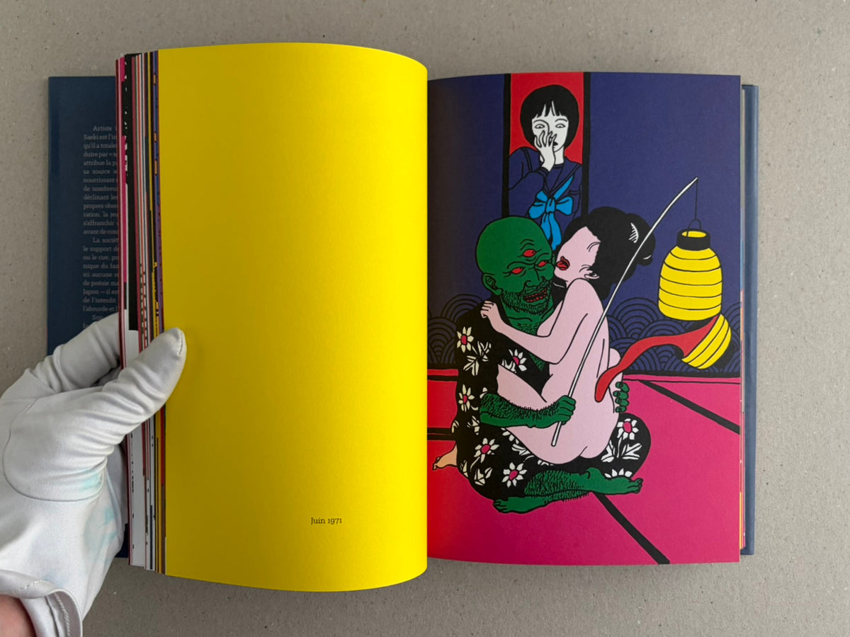 Rêve écarlate by Toshio Saeki open to a yellow-and-purple spread with an illustrated figure and a seated green figure.