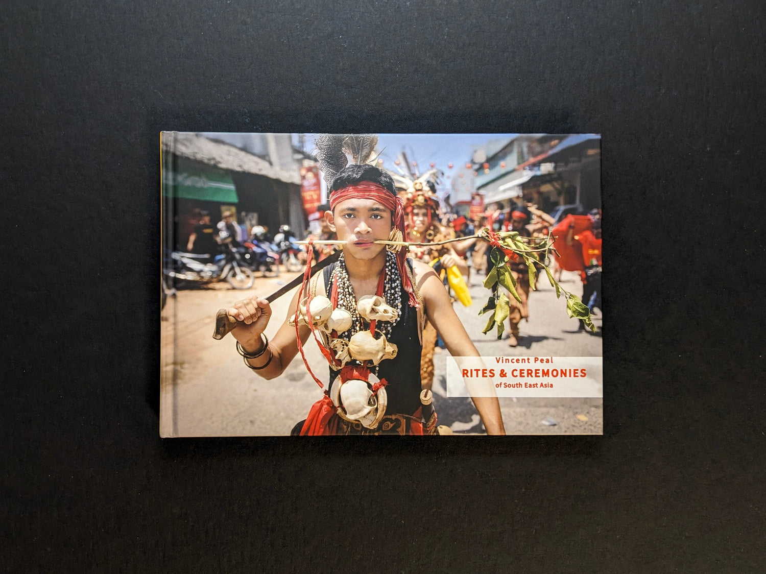 Front cover of Rites & Ceremonies of South East Asia by Vincent Peal, showing a portrait from a ritual procession.