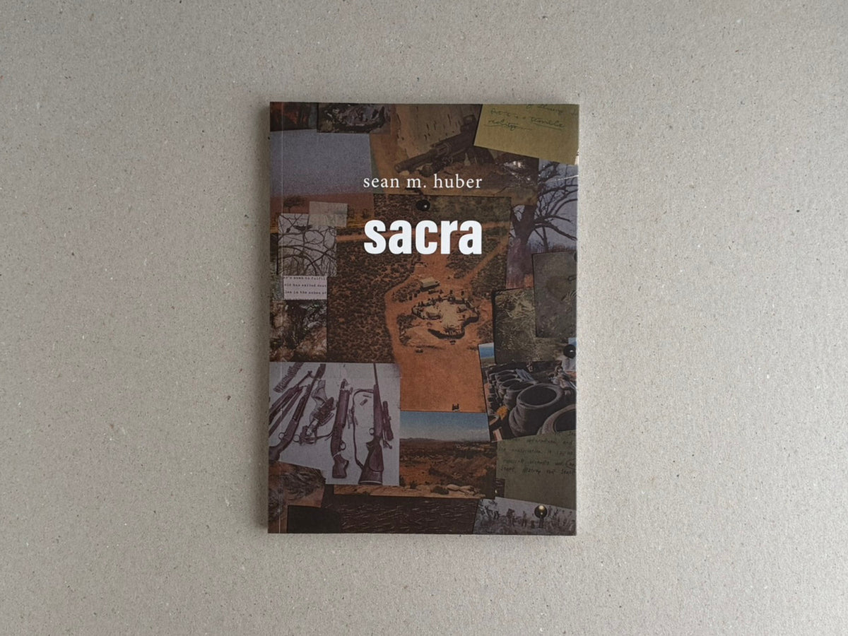 Cover of Sacra by Sean M. Huber, shown on a neutral background.