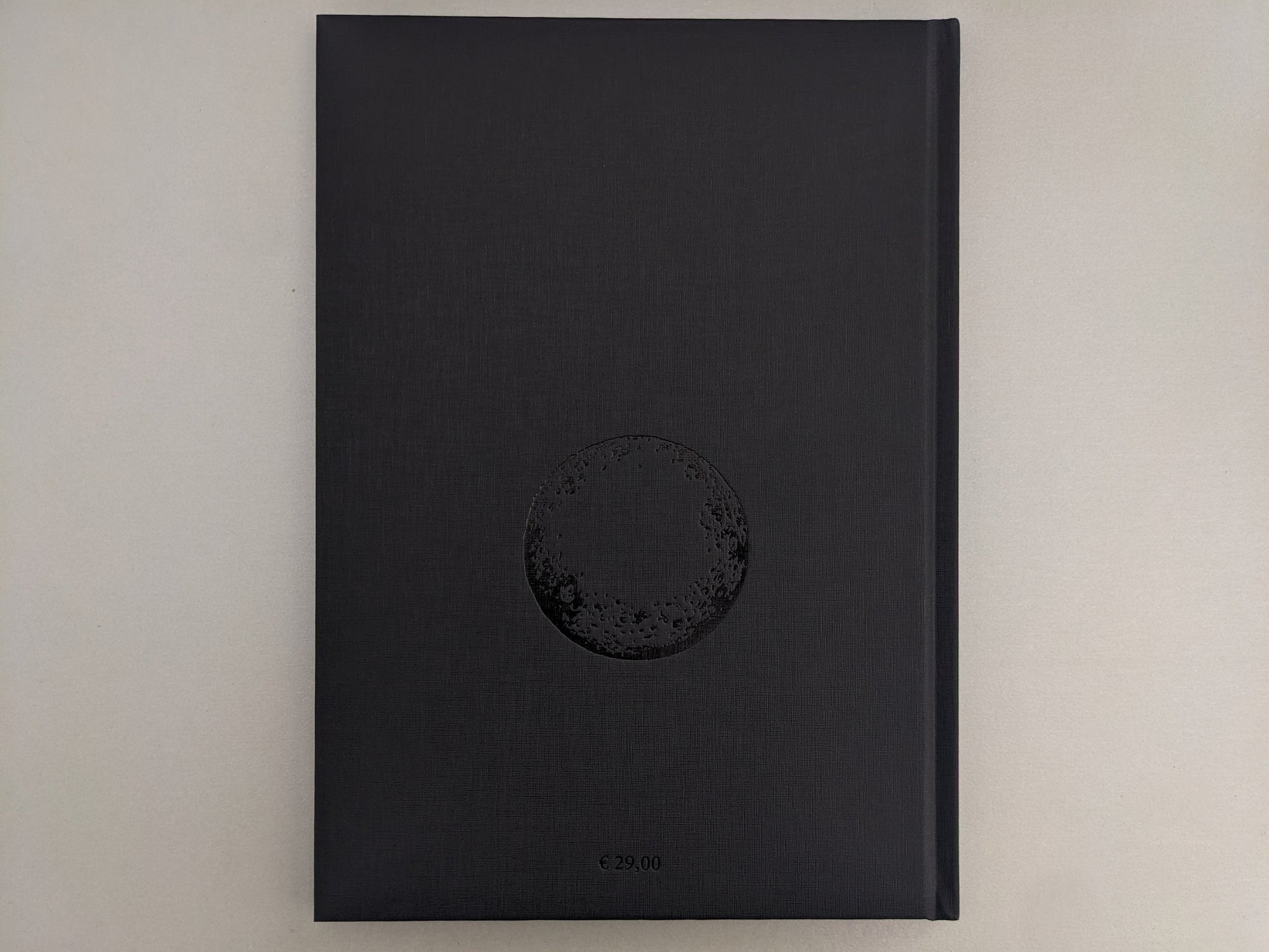 Back cover of Scions of Voodoo with black hot-foil design