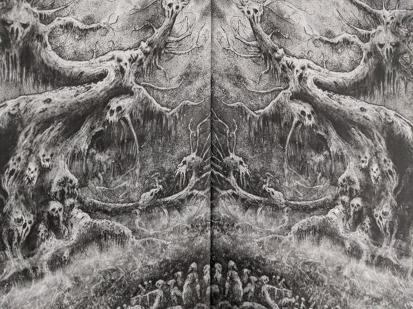Black-and-white illustration of twisted tree roots from Scions of Voodoo