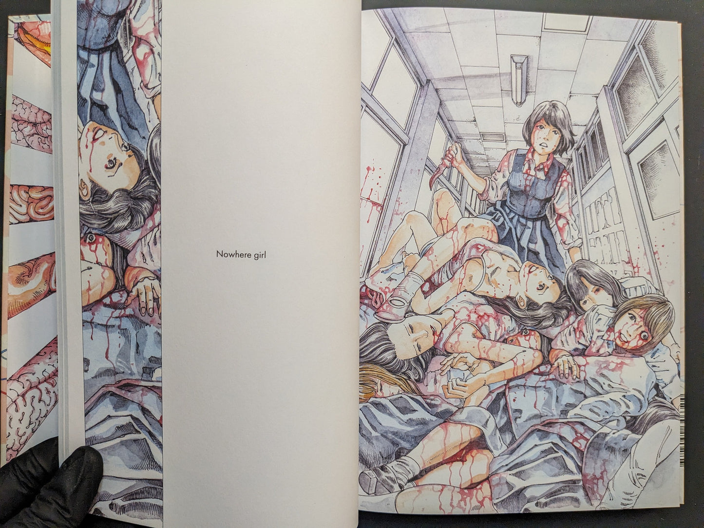 Interior spread titled “Nowhere girl” showing a hallway scene with figures and blood effects.