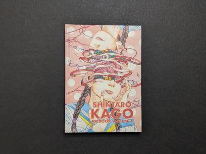Front cover of Shintaro Kago: Artbook Vol. 1 (Third Edition) with an exploded portrait illustration and red title text.