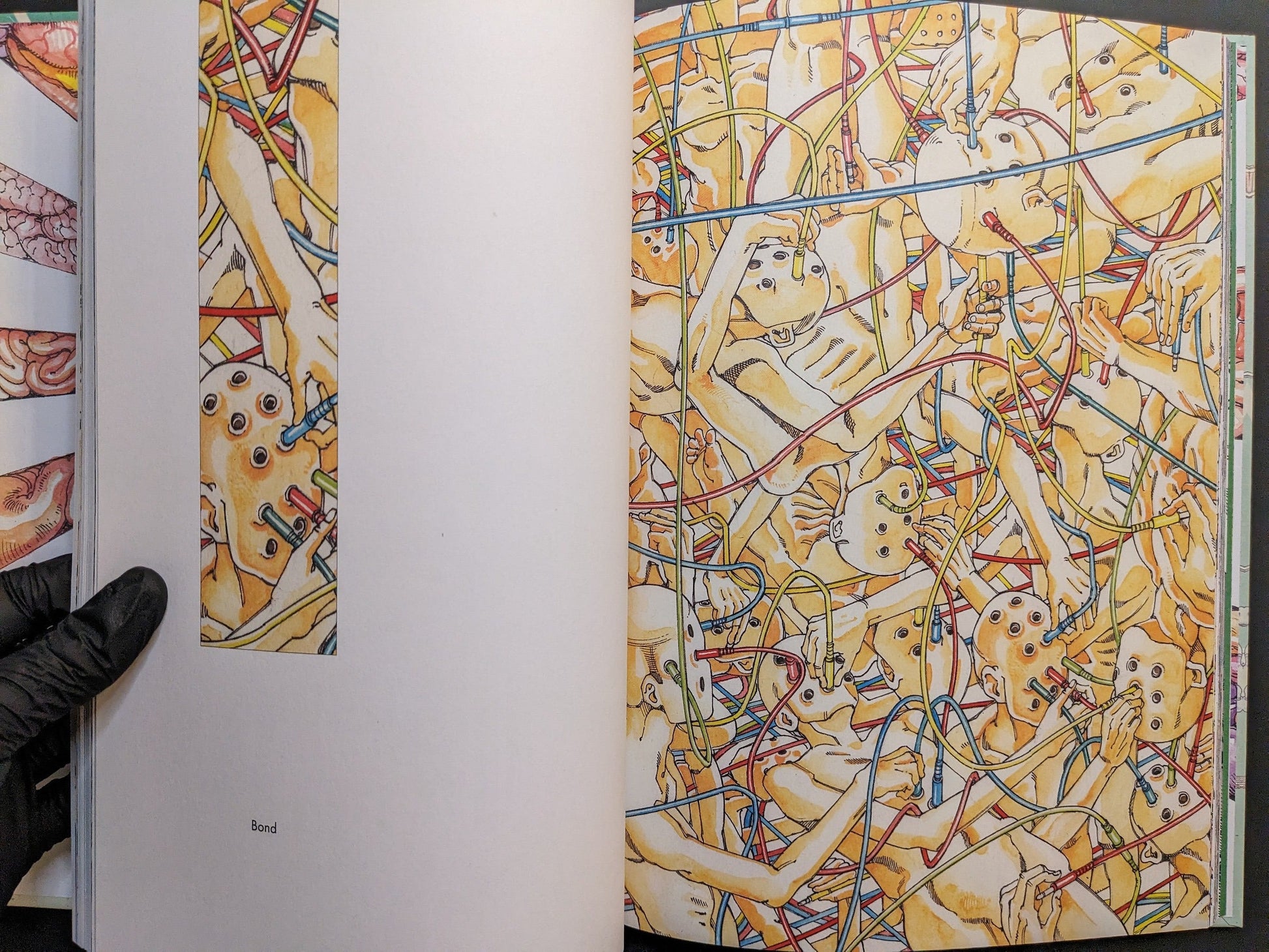 “Bond” spread with wired figures and multicolored tubes in an intricate network.