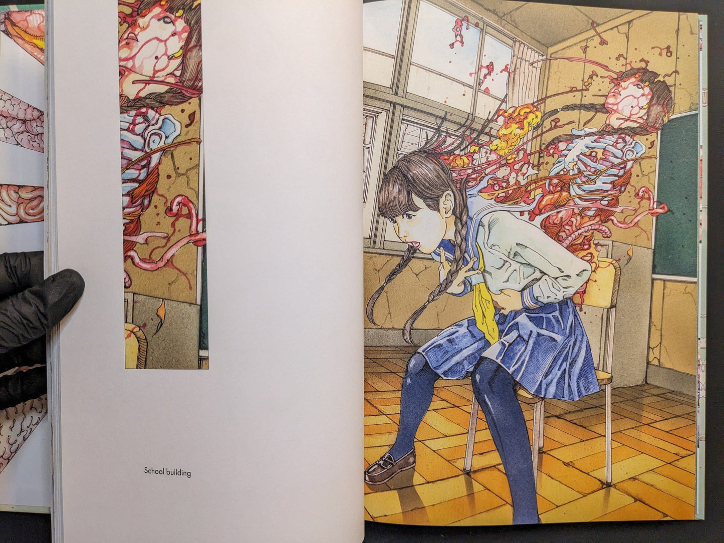 Schoolgirl seated in a classroom with exposed interior forms; “School building” captioned artwork.