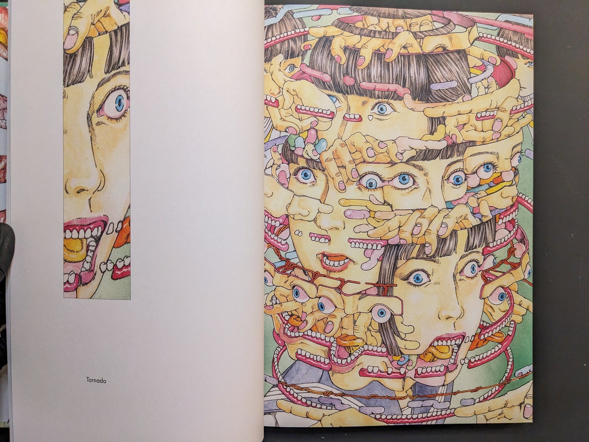 “Tornado” spread of interlocking faces, hands and teeth in Shintaro Kago’s body-horror collage style.