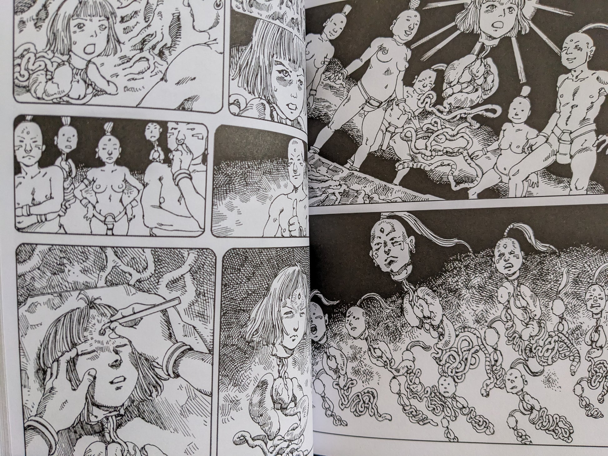 Scene depicting floating heads and disembodied characters in a grotesque ceremony