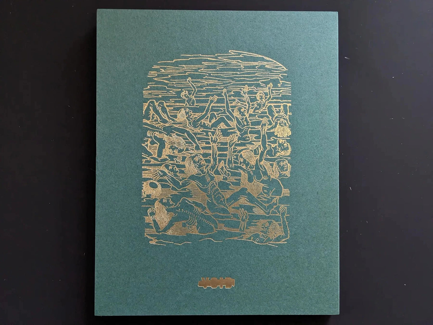 Back cover: teal board with a gold-foil line drawing of figures in water.