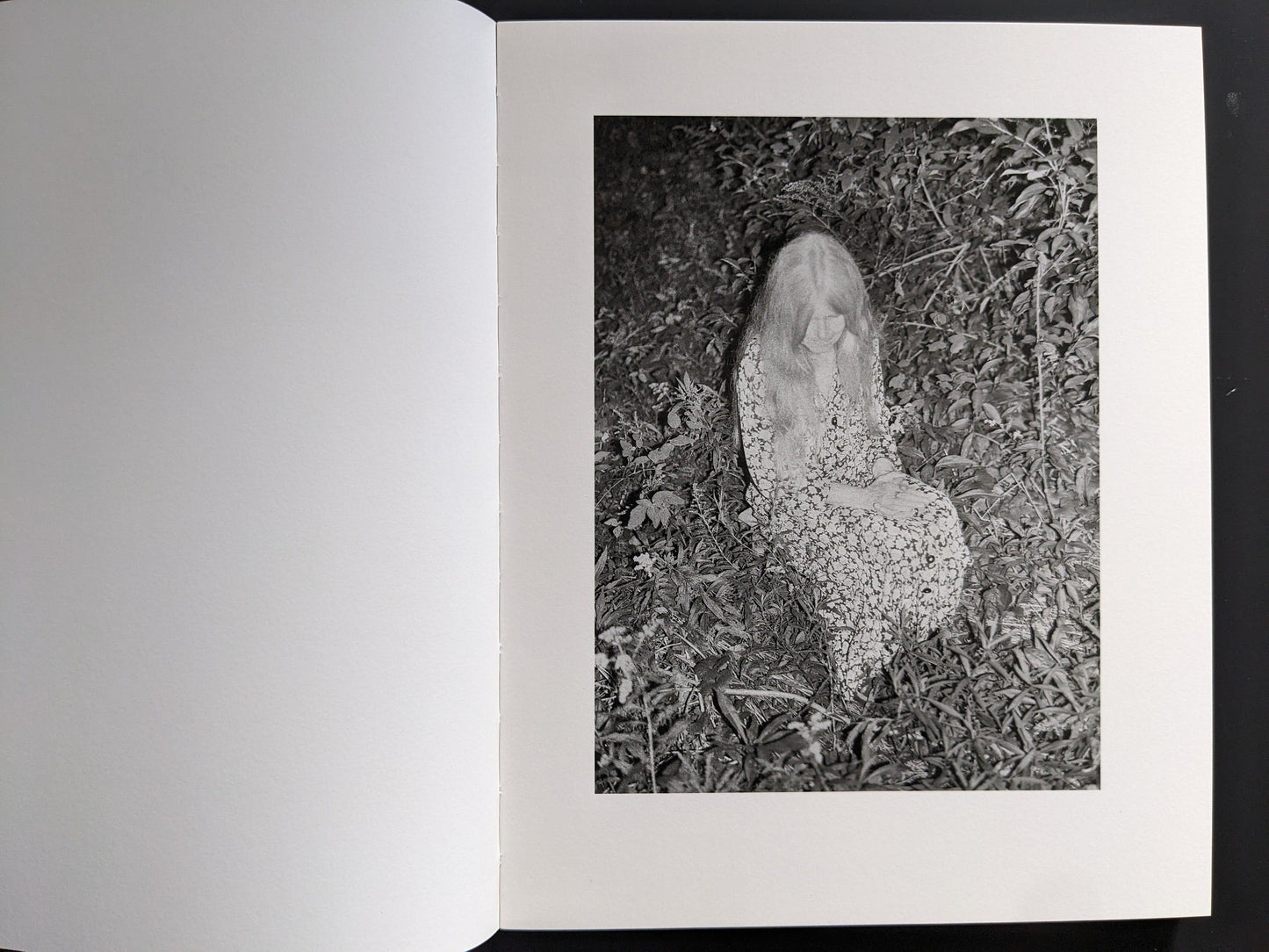 Interior spread: nocturnal scene with human form on forest floor from “Sleep Creek.”