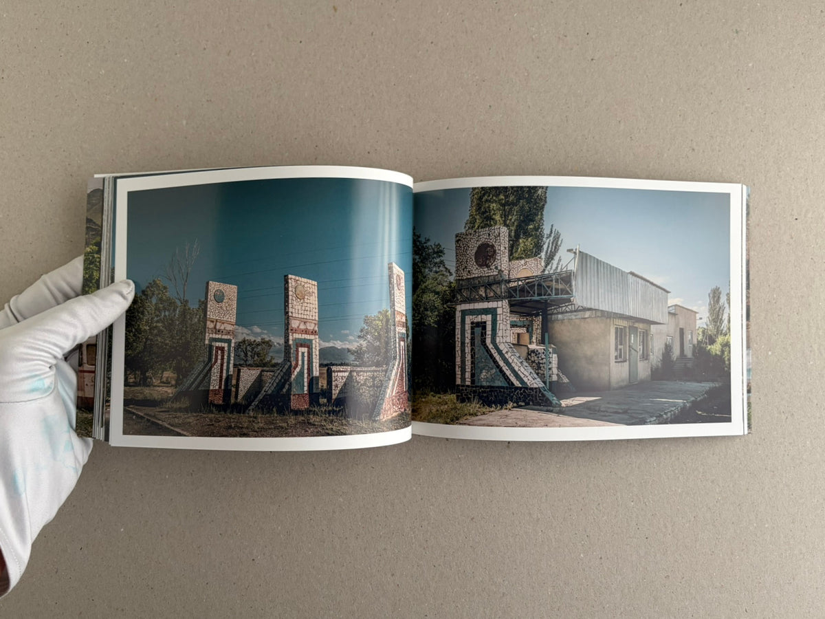 Open spread from Soviet Architectural Design by Hoshino Ai, showing a mural-covered bus stop interior on the left and a weathered painted wall on the right.